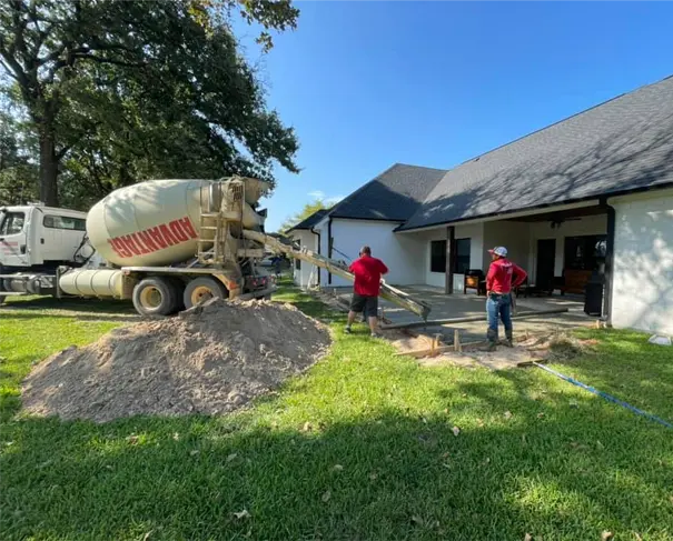 Guys Pouring Concrete